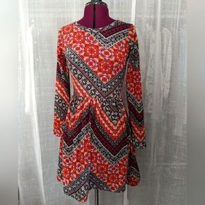 Orange zig zag pattern long sleeve dress by Everly